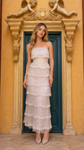 Front view of champagne tiered beaded strapless maxi dress