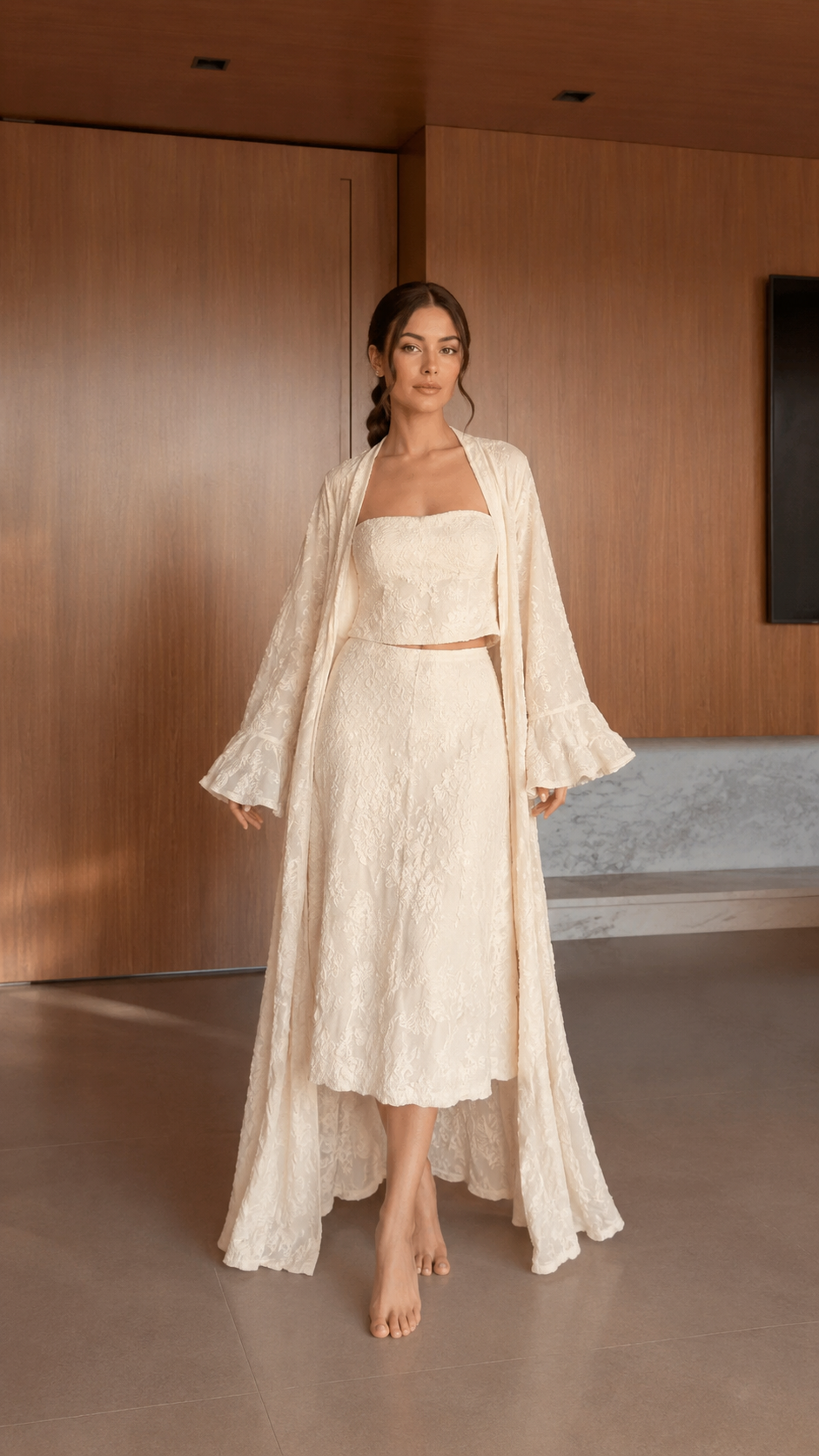 Front view of ivory textured 3-piece skirt set with long duster and square-neck crop top