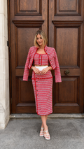 Front view of red tweed-look three-piece skirt set with cropped jacket, crop top, and midi pencil skirt