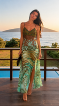 Front view of aqua lace bodice maxi dress with sheer waist panel and side slit