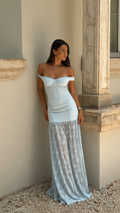 Front view of powder blue off-shoulder ruched maxi dress with lace-look sheer hem