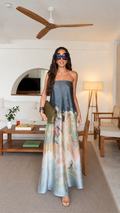 Front view of slate blue strapless printed satin-look maxi dress