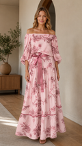 Blush pink off-shoulder floral maxi dress with puff sleeves and tie waist front view