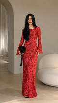 Front view of red floral jacquard bell sleeve maxi dress