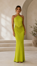 Front view of lime halter mermaid maxi dress with fringe waist detail