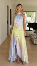 Model wearing multi ombre halter maxi dress from the front