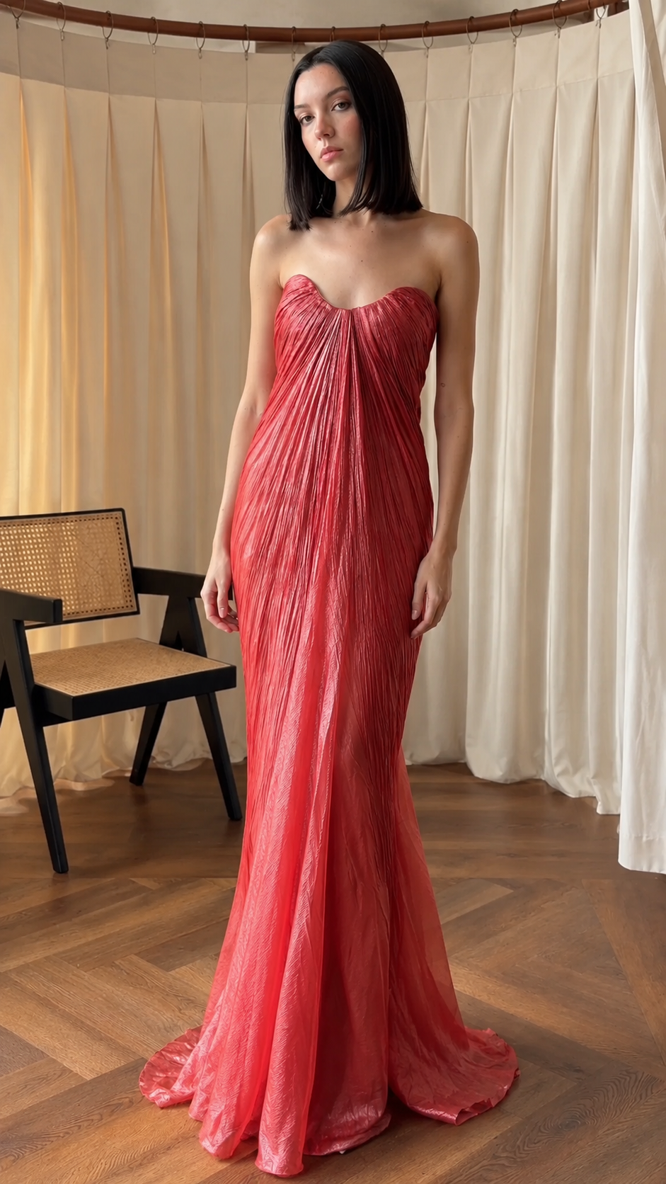 Front view of rose red strapless pleated mermaid maxi evening dress