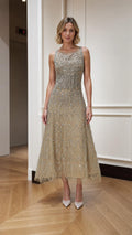 Champagne embellished sleeveless A-line midi dress shown from the front
