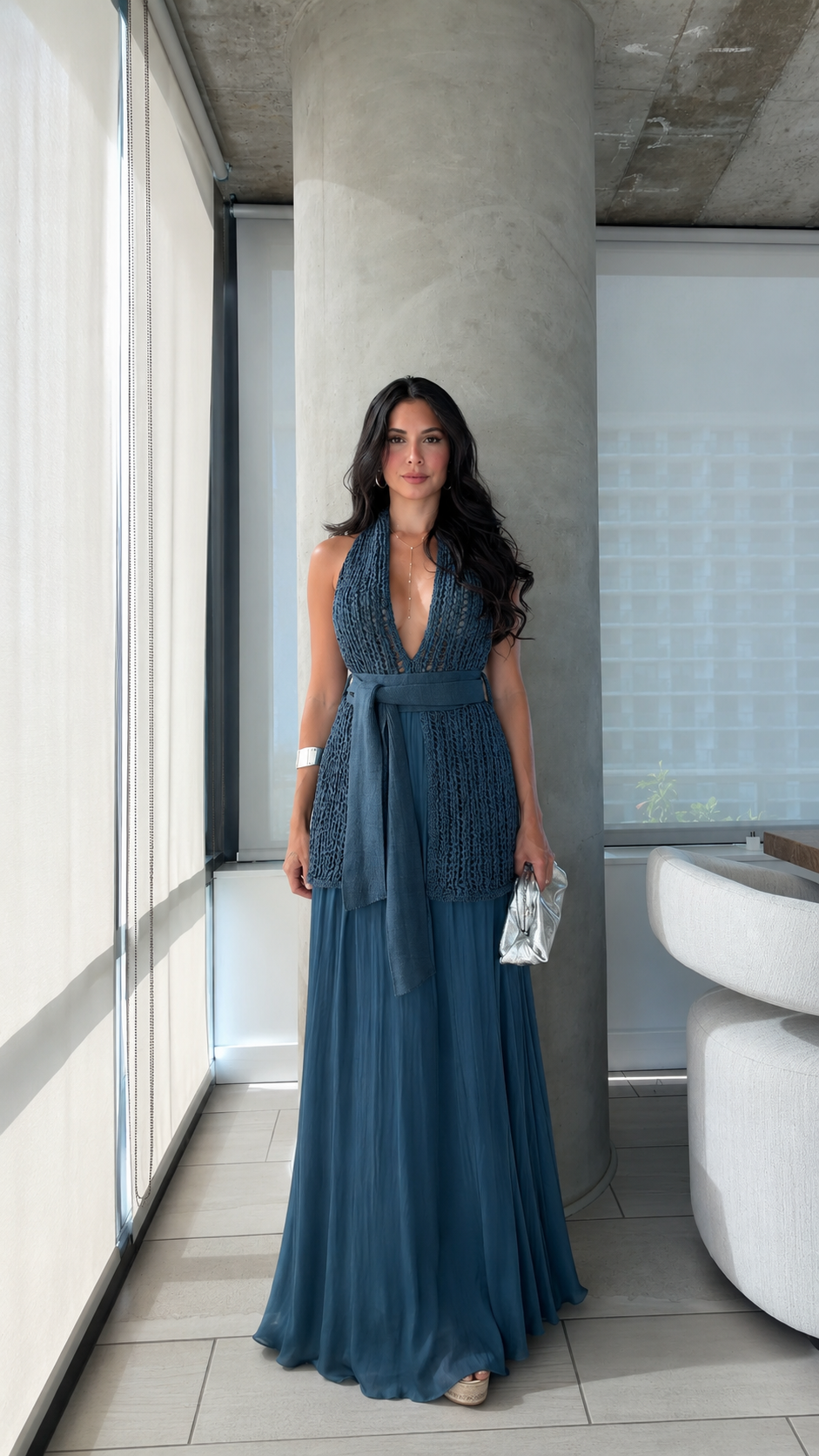 Front view of slate blue plunging halter maxi dress with textured bodice and tie waist