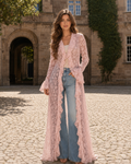 Blush pink sheer lace maxi duster cardigan with ruffle front worn over a cami and jeans