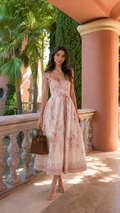 Front view of blush pink floral midi dress with sweetheart neckline and full skirt