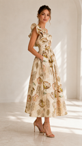 Front view of cream floral one-shoulder ruffle midi dress with pockets