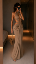 Taupe halter cutout maxi dress with ruched waist and floor-length skirt front view