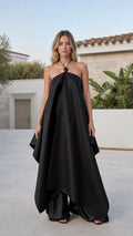 Front view of black halter neck satin jumpsuit