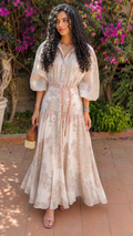 Front view of blush ivory floral maxi shirt dress with puff sleeves and rope tie waist