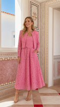 Front view of woman wearing pink lace crop jacket and midi dress set