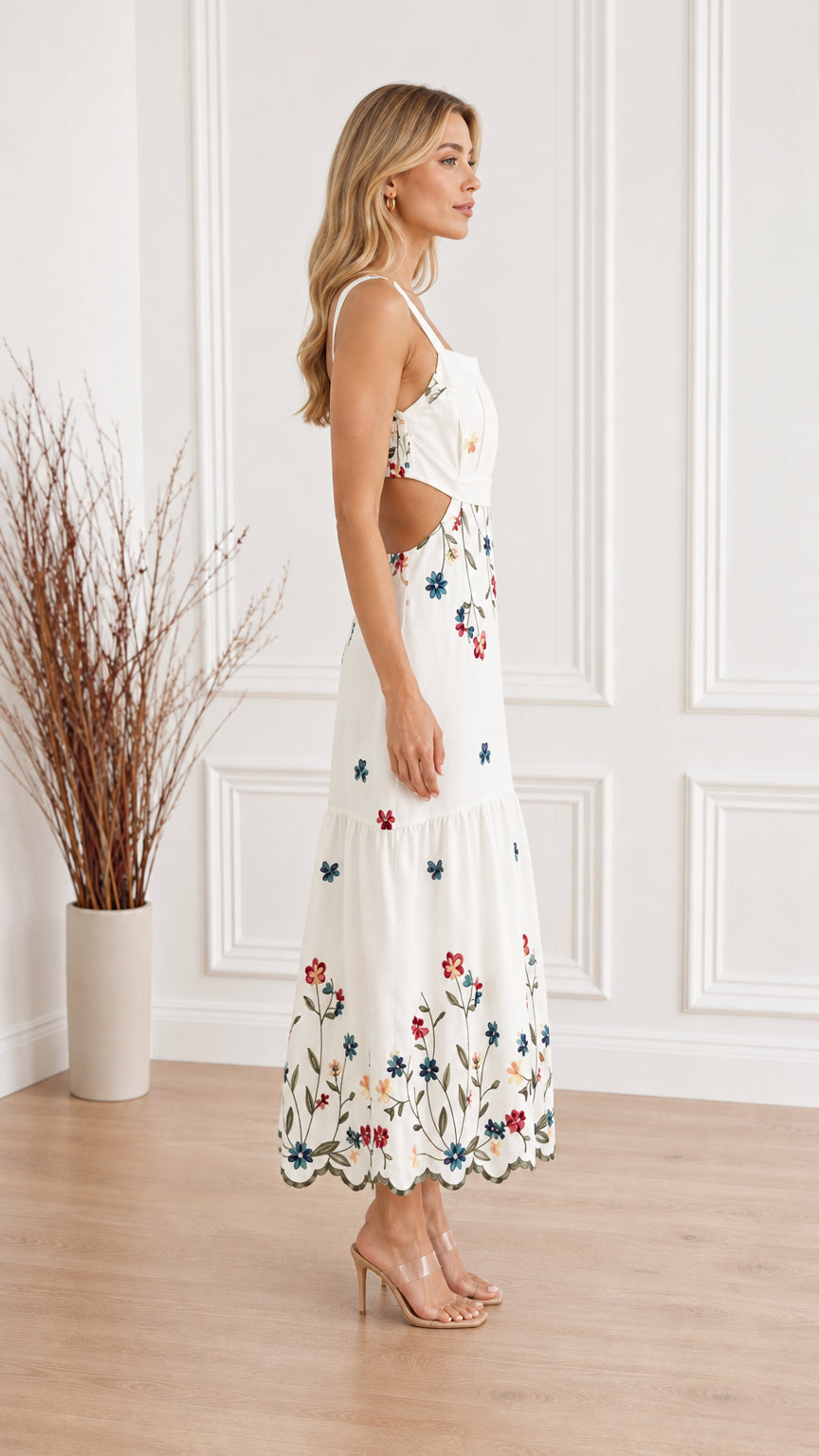Side profile view of White floral cutout maxi dress