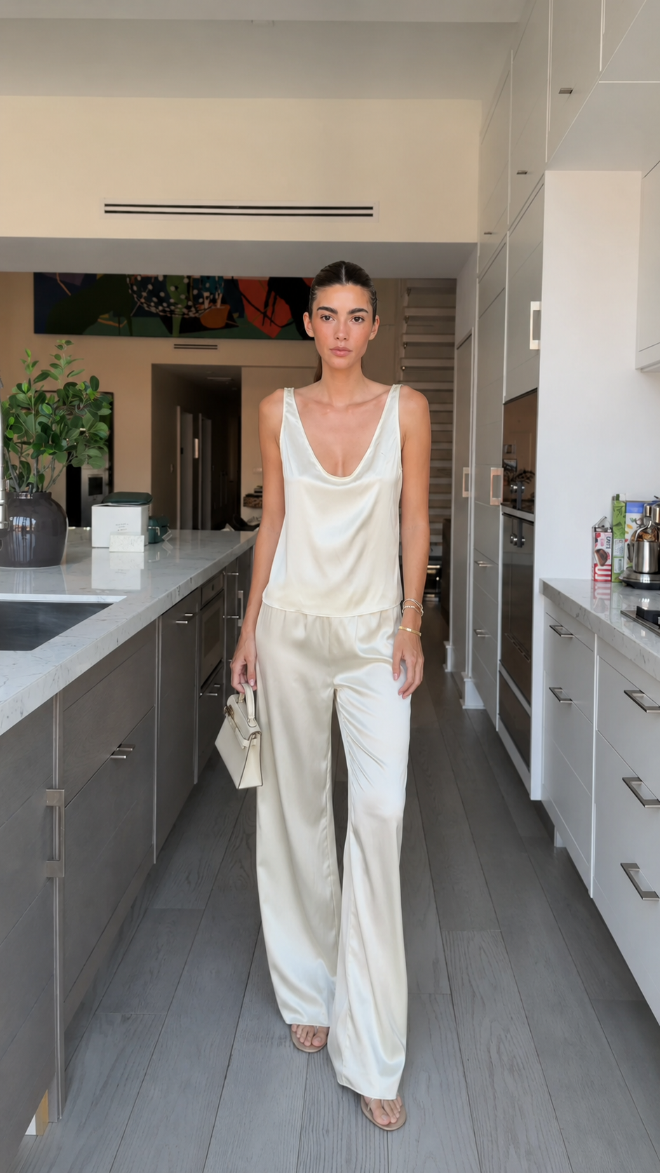 Full front view of ivory satin-look two-piece wide leg pants set