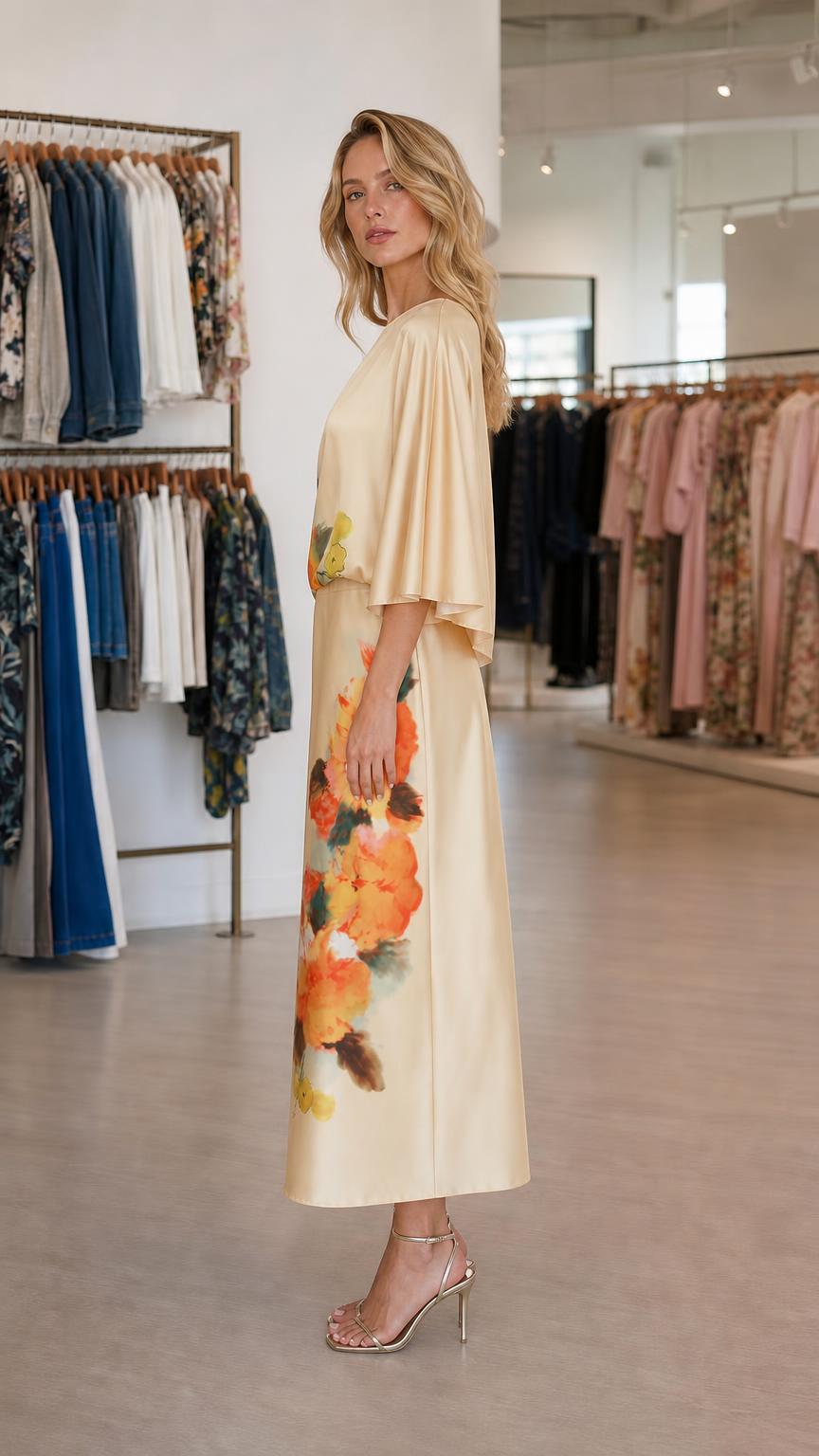Side profile view of champagne midi dress
