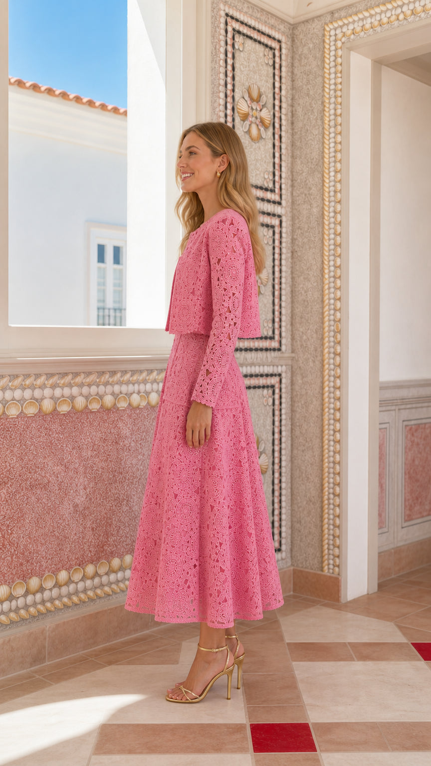 Side profile view of woman wearing pink lace matching set
