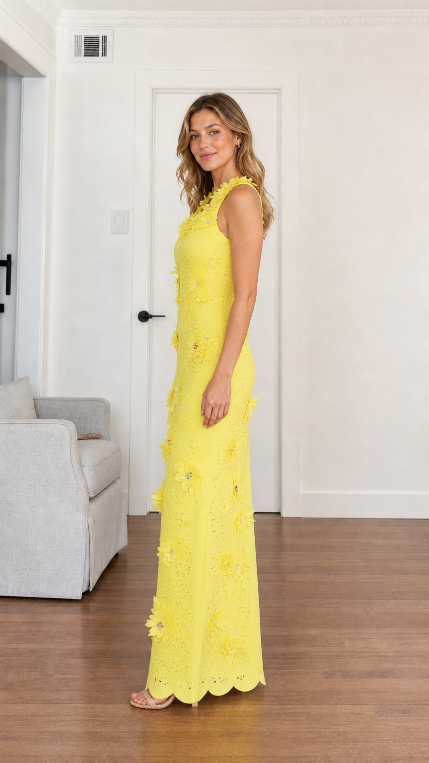 Side profile of woman wearing yellow formal maxi dress