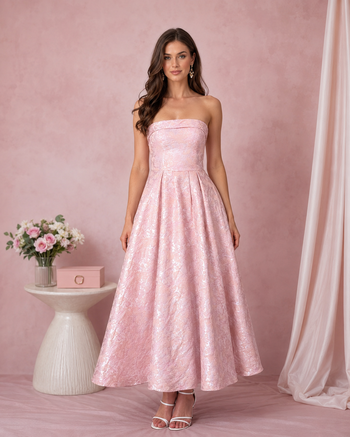 Front view of blush pink strapless jacquard A-line midi dress