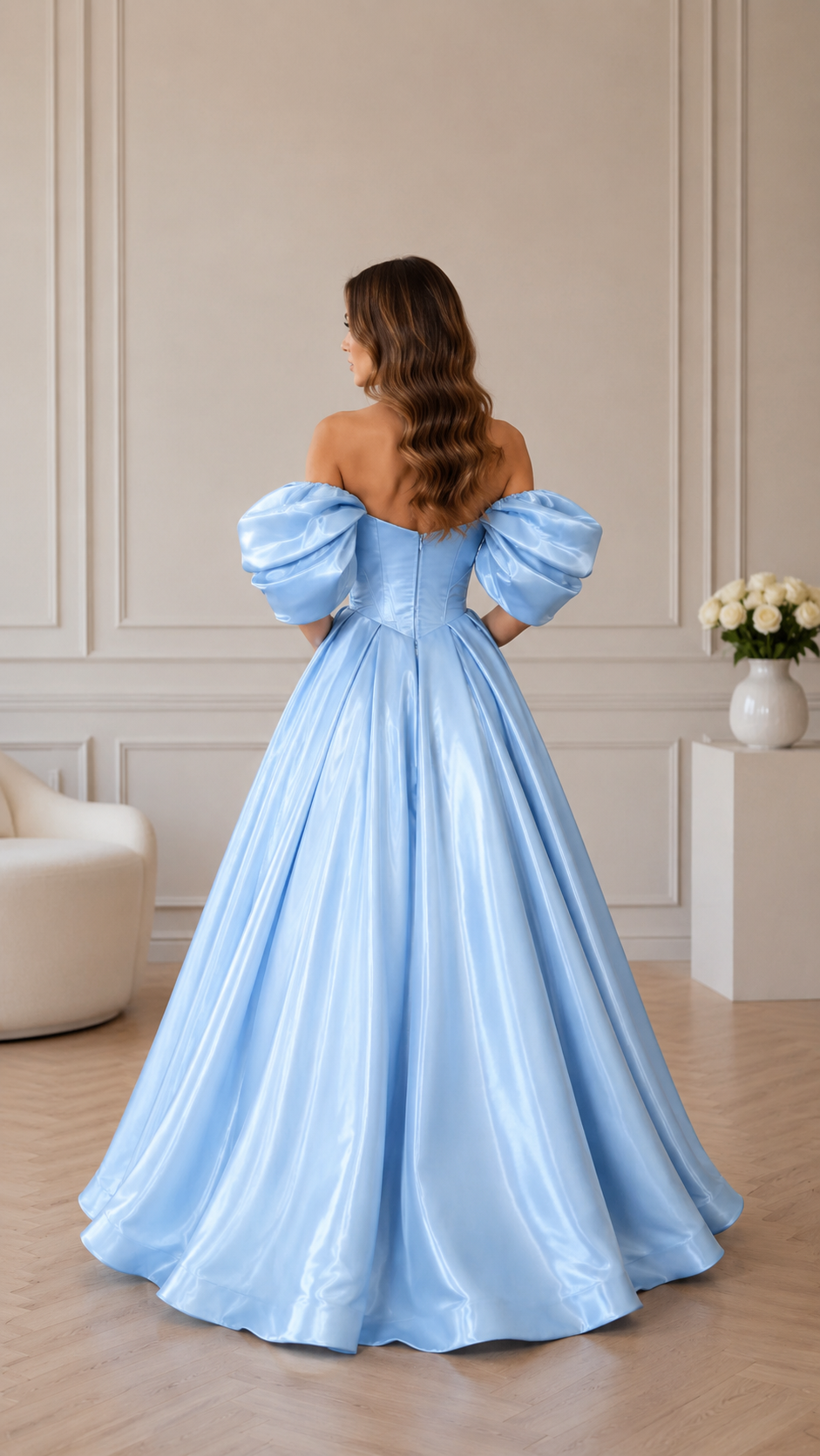 Back view of sky blue formal ball gown with puff sleeves and full skirt