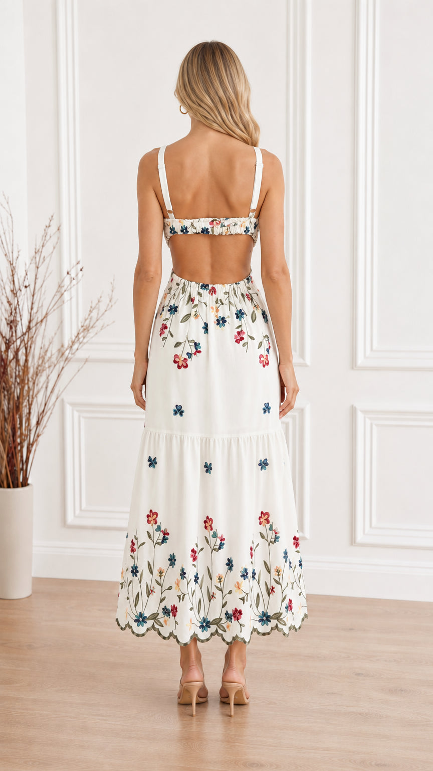 Back view of White floral embroidered maxi dress showing back cutout