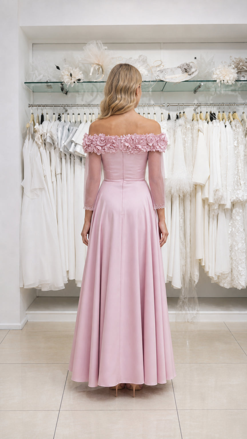 Model wearing pink formal dress, back view