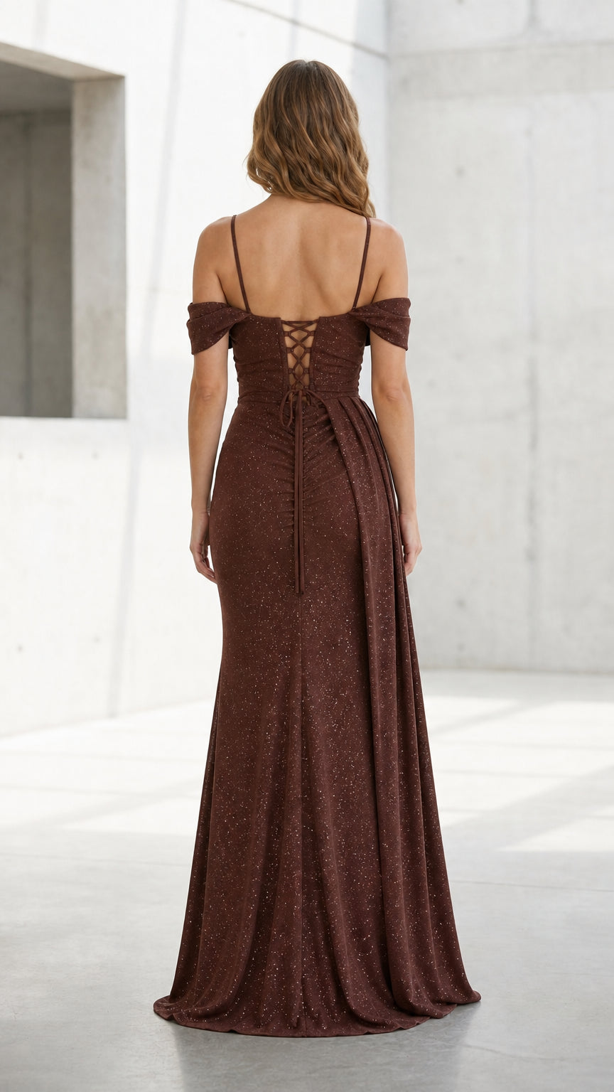 Back view of brown evening gown showing lace-up corset detail