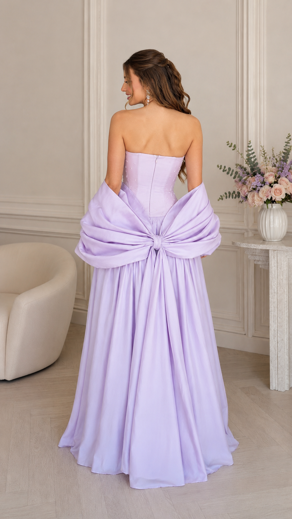 Back view of lavender strapless gown with draped matching shawl