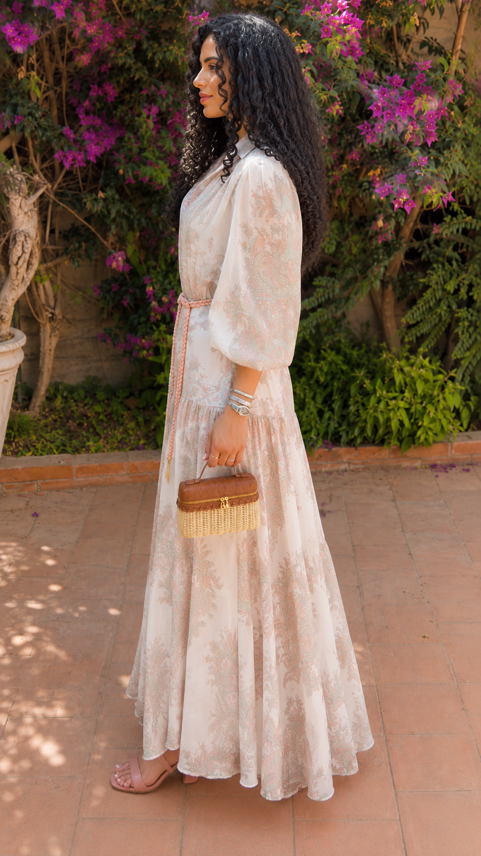 Side view of blush ivory floral maxi shirt dress showing full-length drape and waist tie
