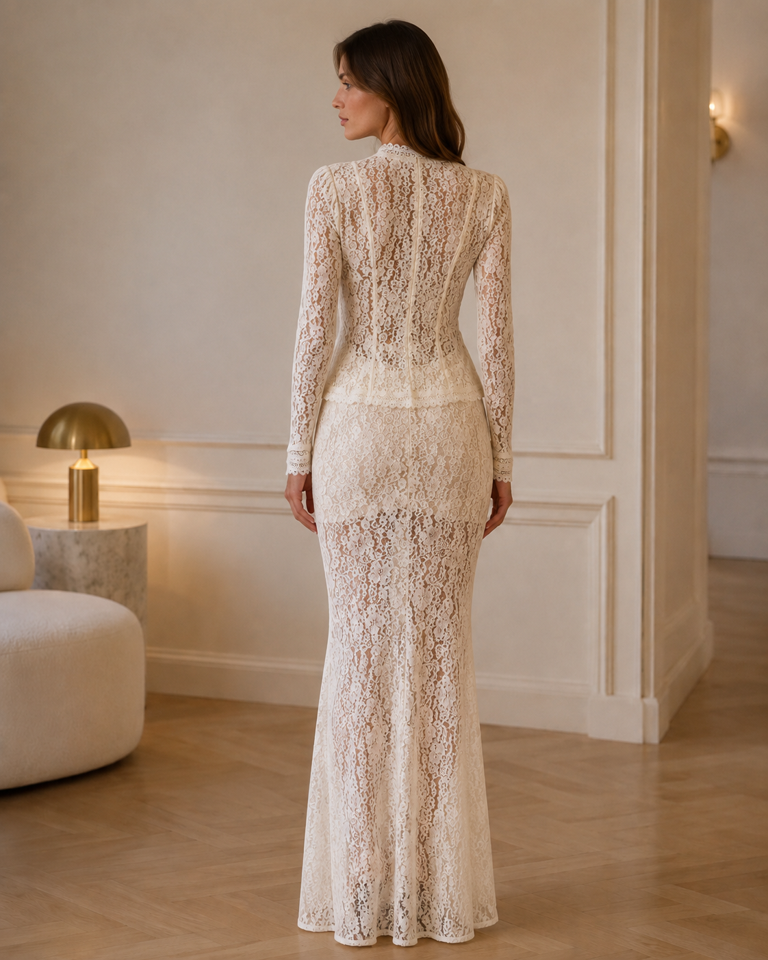 Back view of ivory lace floor-length mermaid dress with fitted long sleeves