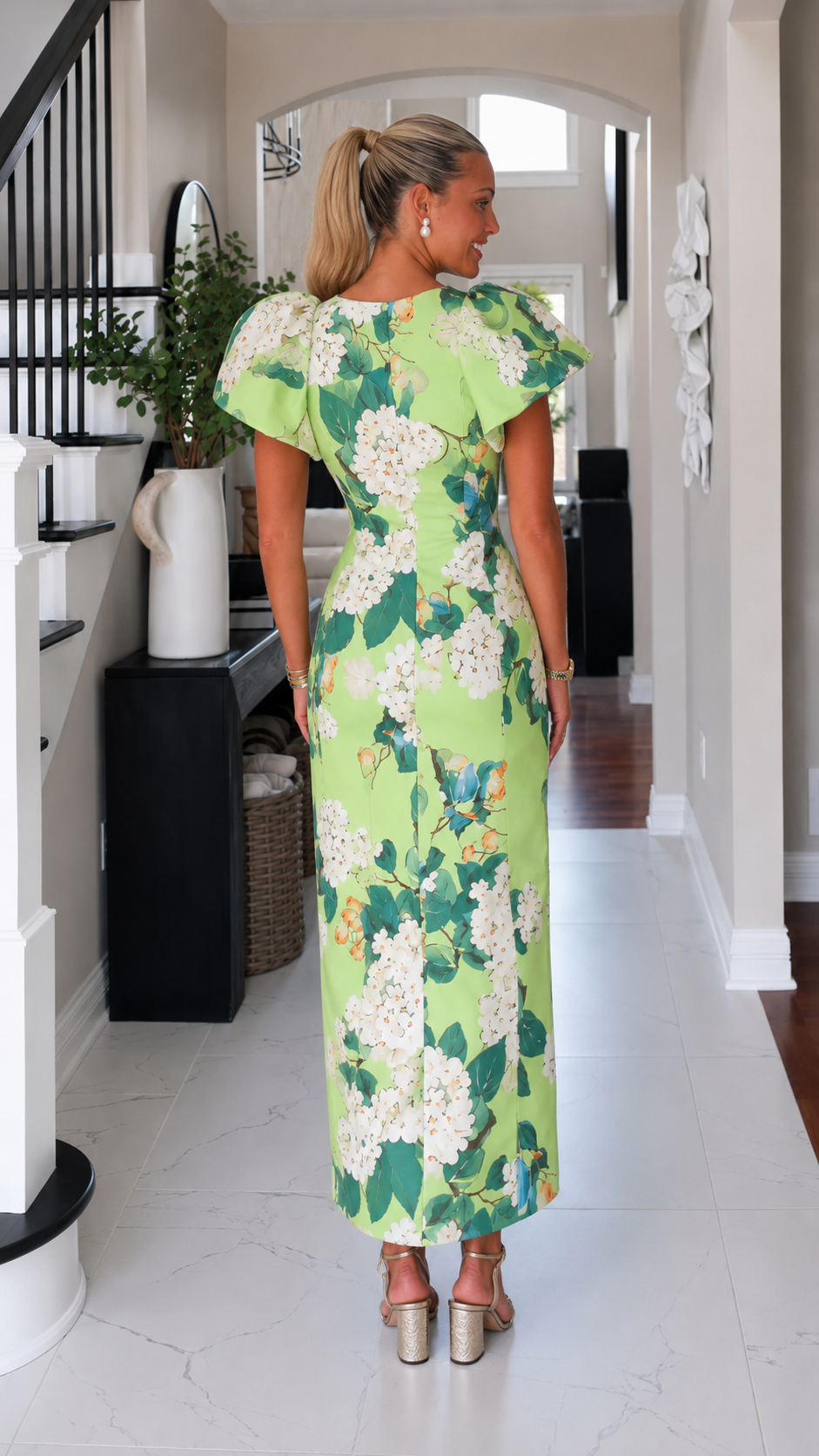 Back view of lime green floral maxi dress with full-length floral print