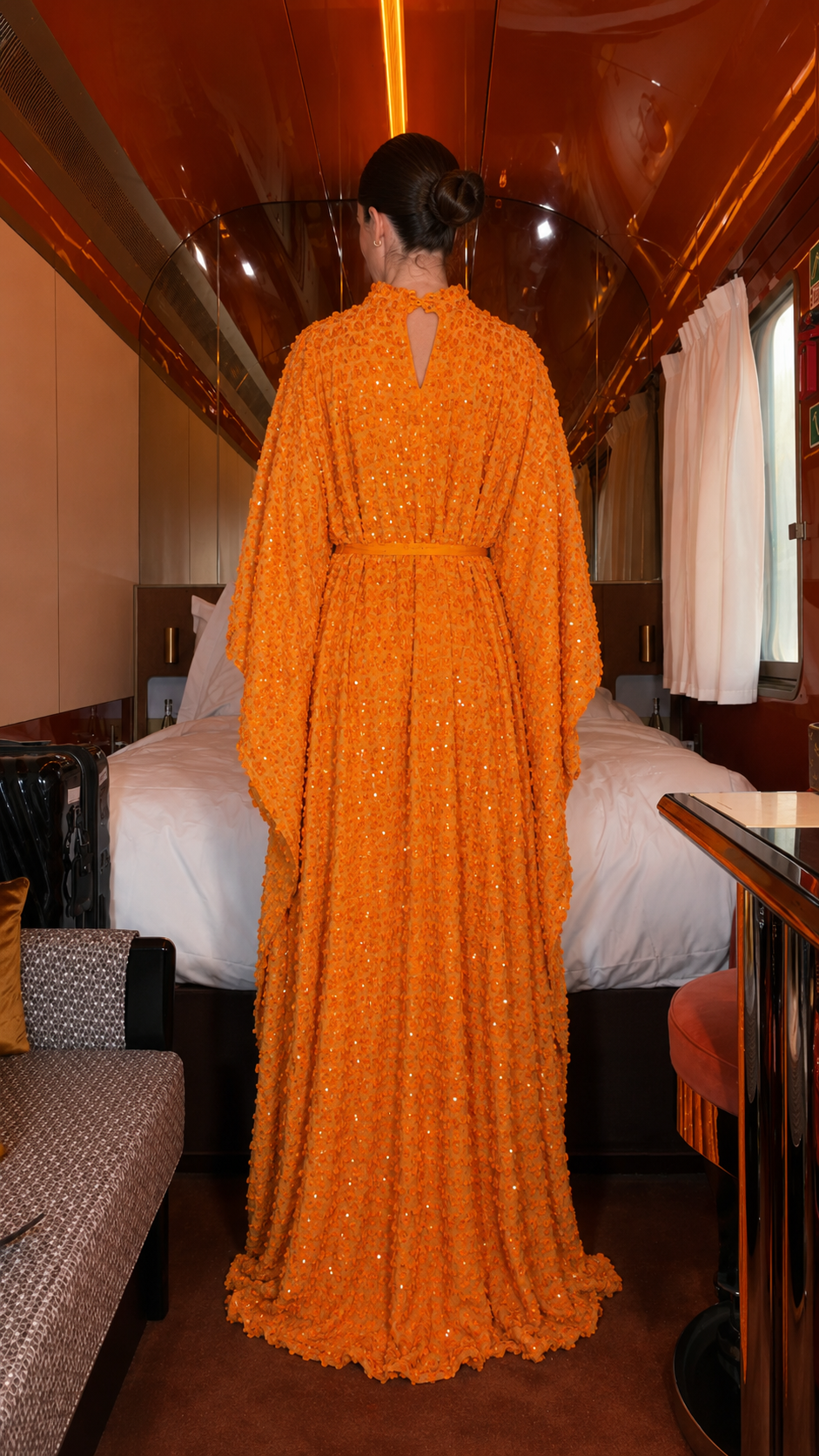 Back view of orange textured maxi caftan dress with back keyhole detail