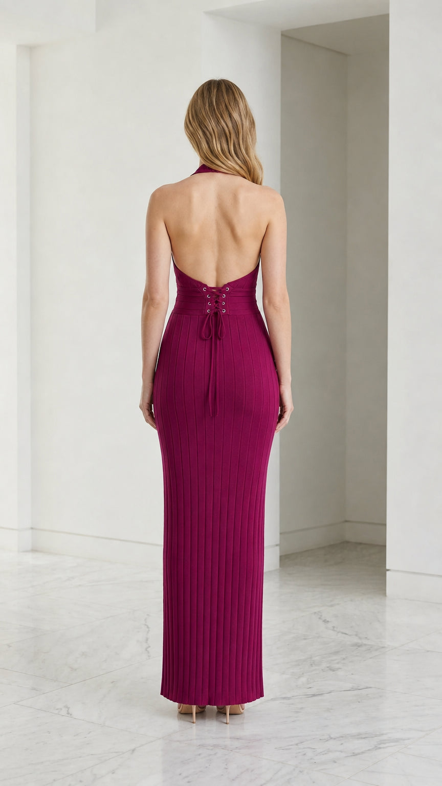 Back view showing lace-up details of magenta dress