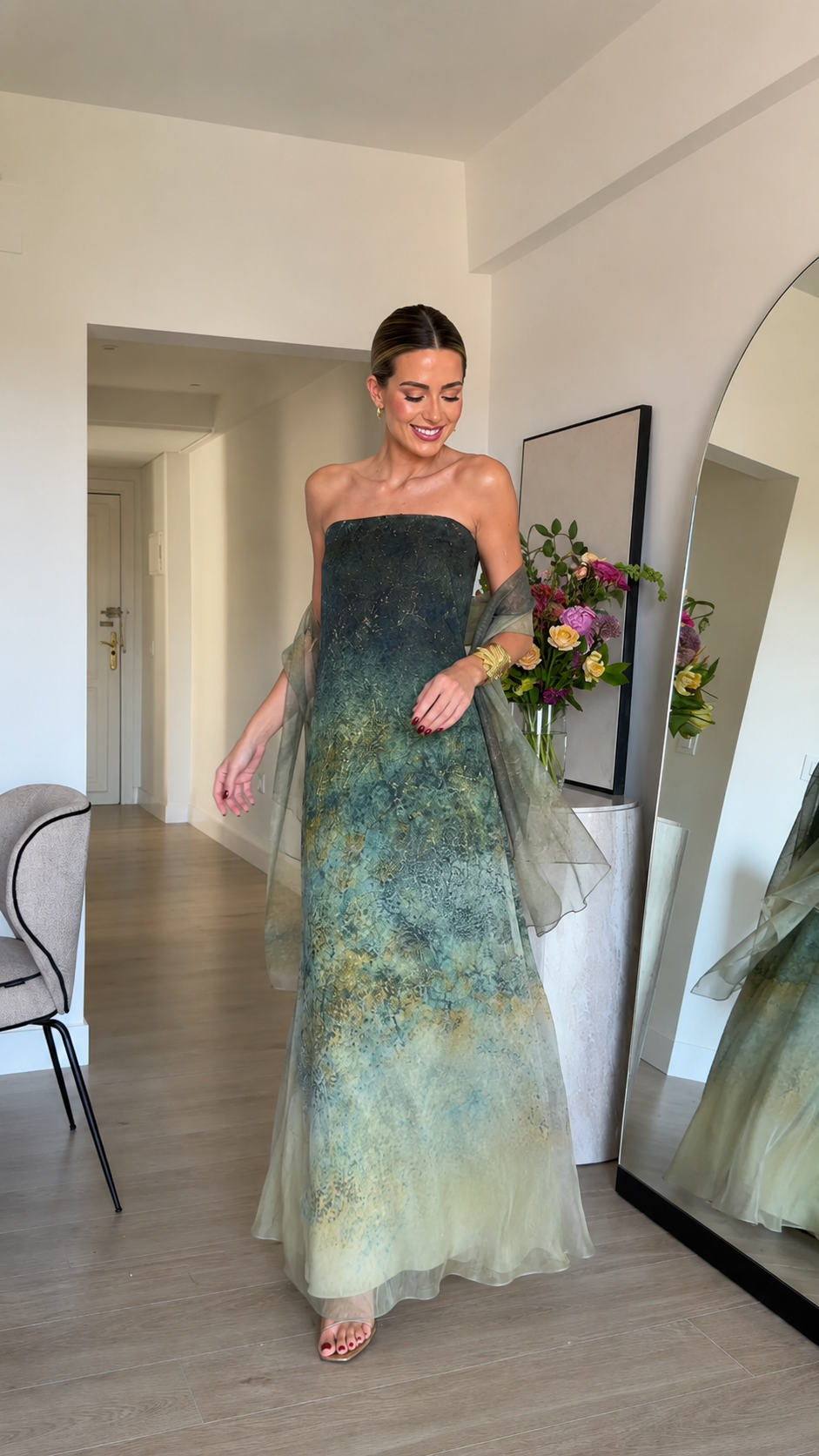 Sage green strapless evening dress with sheer shawl and flowing A-line skirt