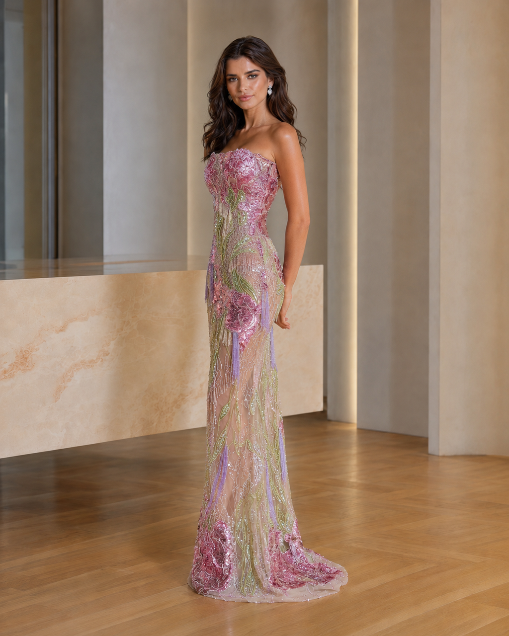 Pink strapless embellished mermaid gown side view