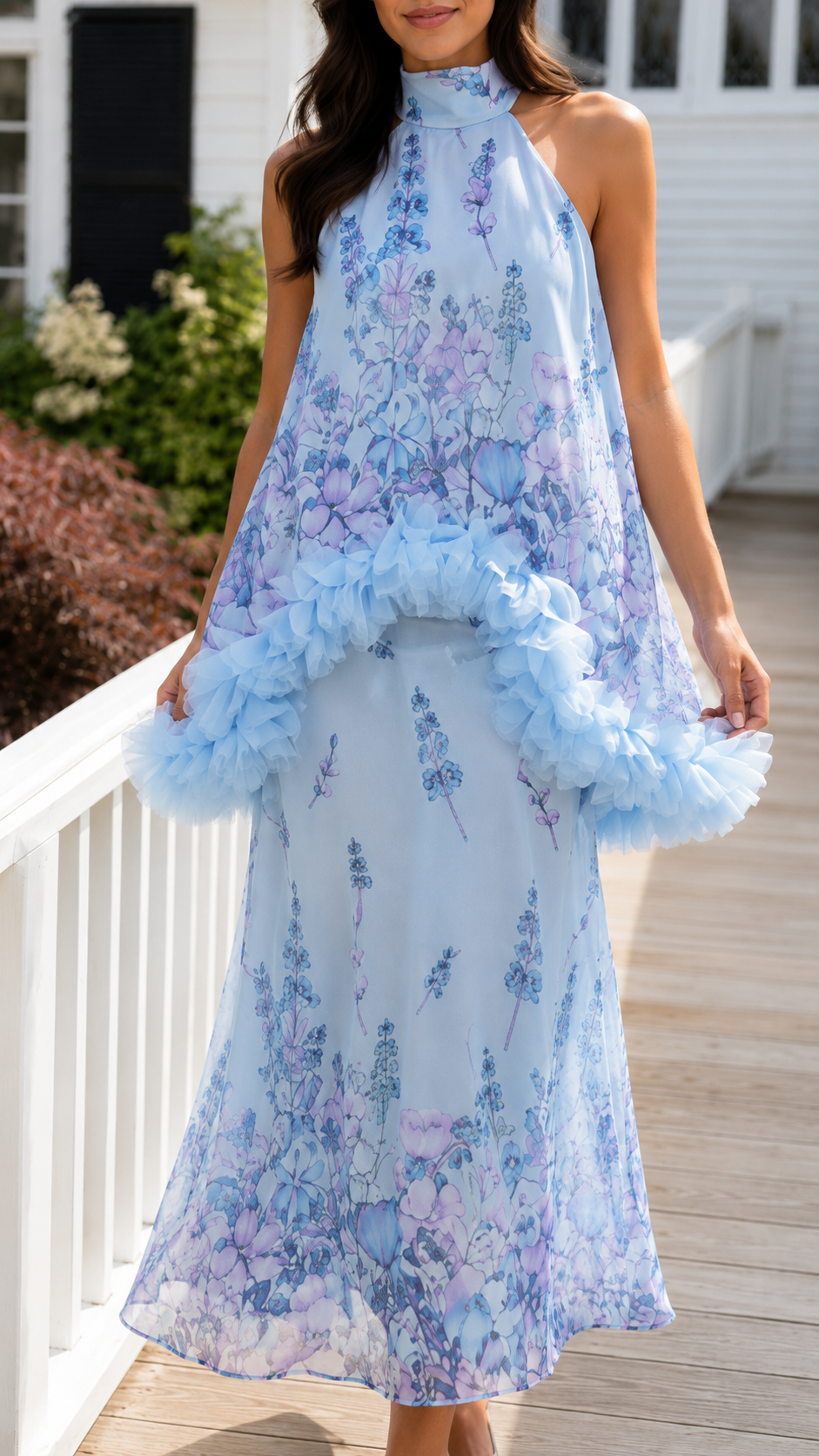 Close front view of powder blue floral halter maxi dress with layered trim