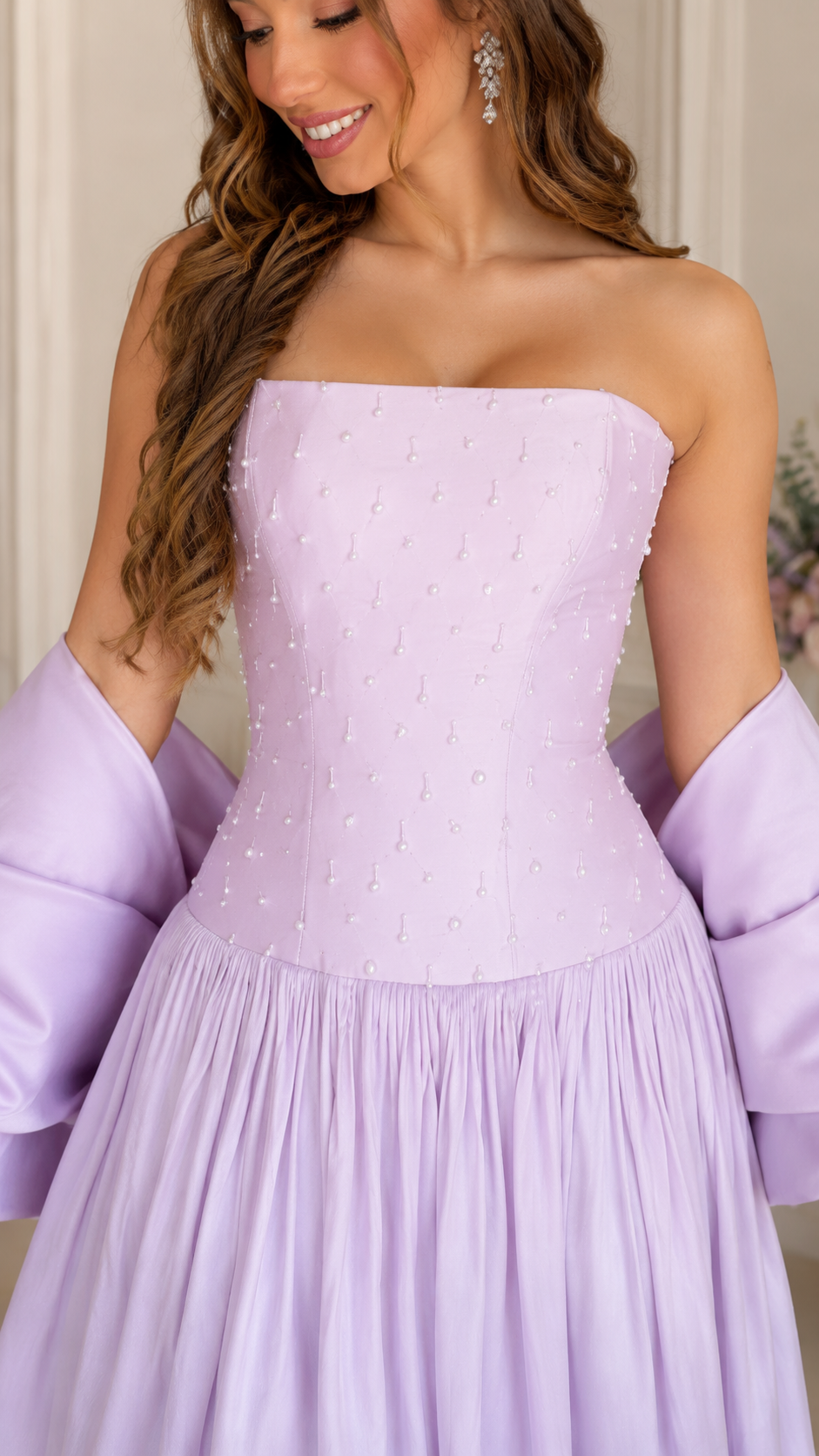 Close-up of lavender embellished corset-style bodice and gathered skirt seam