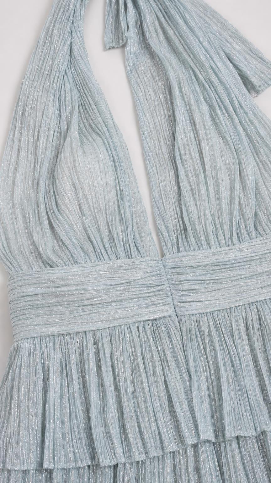 Close-up detail of halter neckline, bodice, and layered ruffles