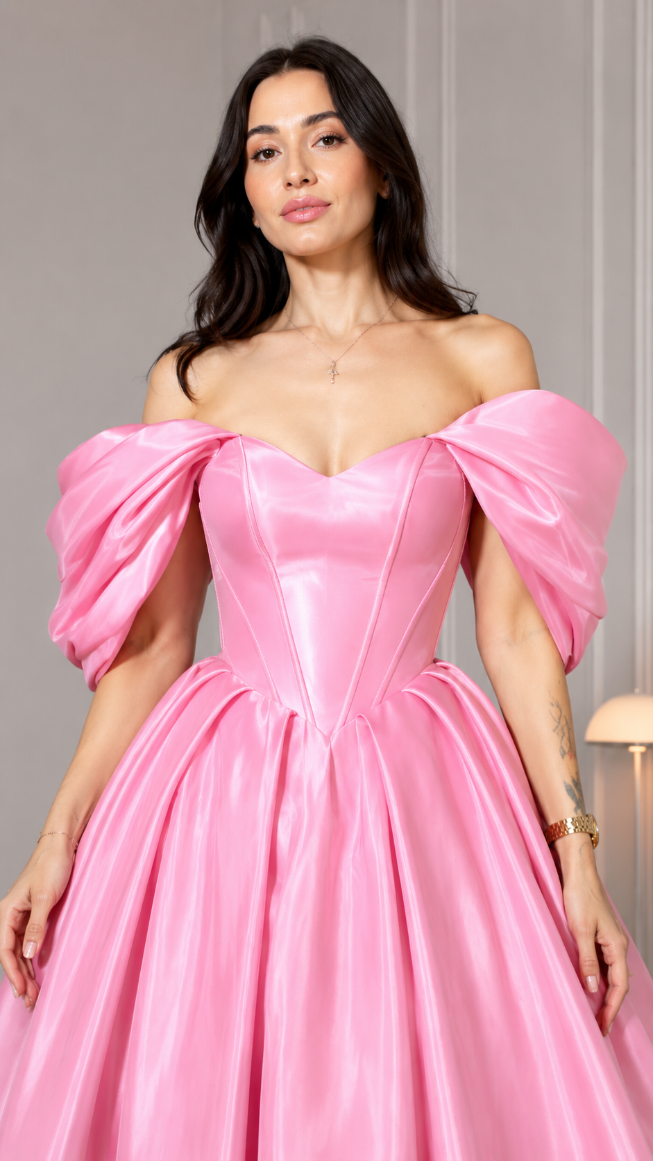 Close-up of pink sweetheart corset-style bodice with off shoulder puff sleeves