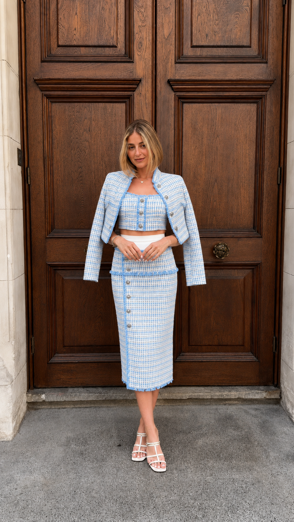 Front view of blue tweed-look three-piece skirt set with cropped jacket and midi skirt