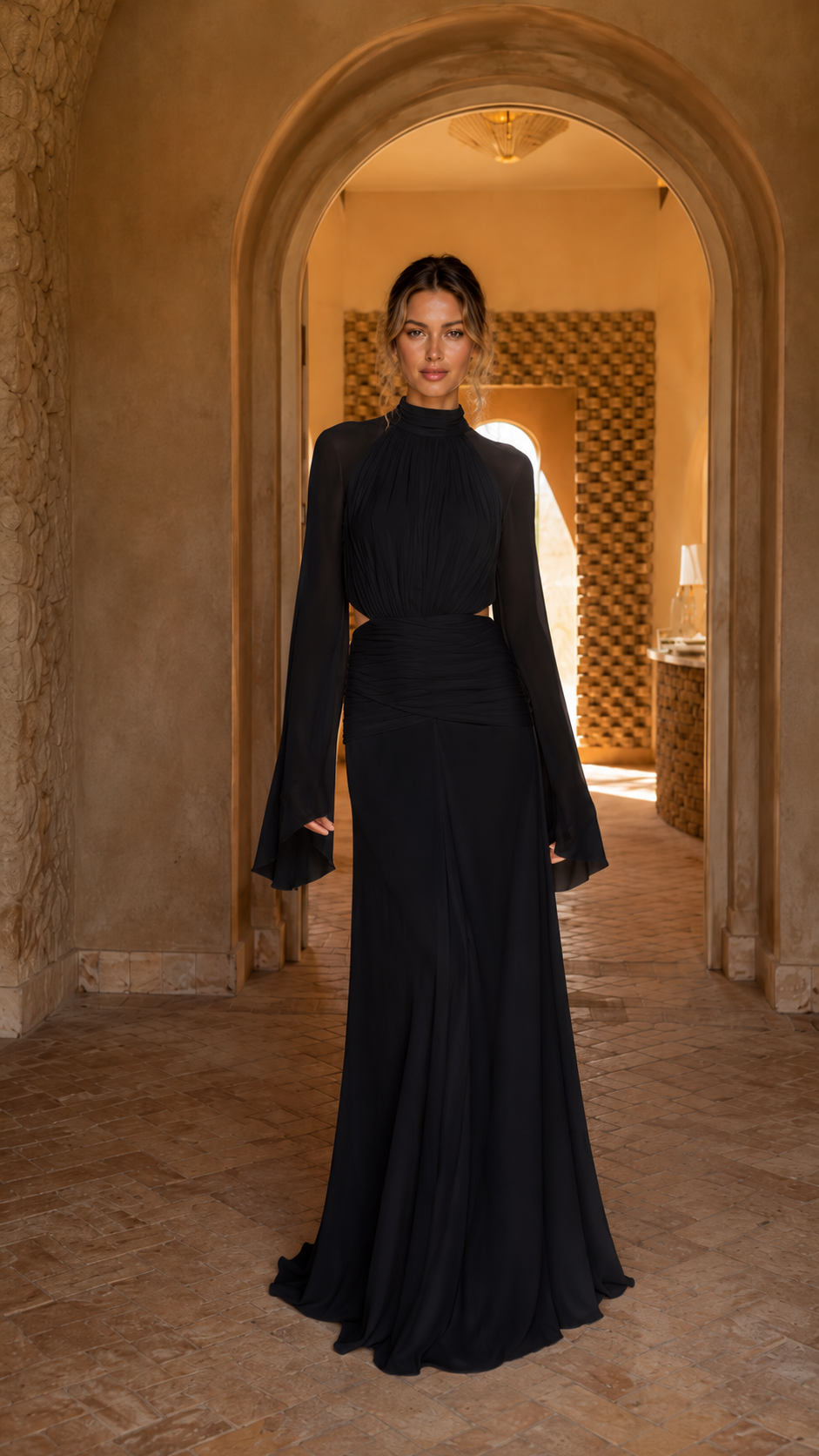 Front view of black mock neck bell sleeve evening gown