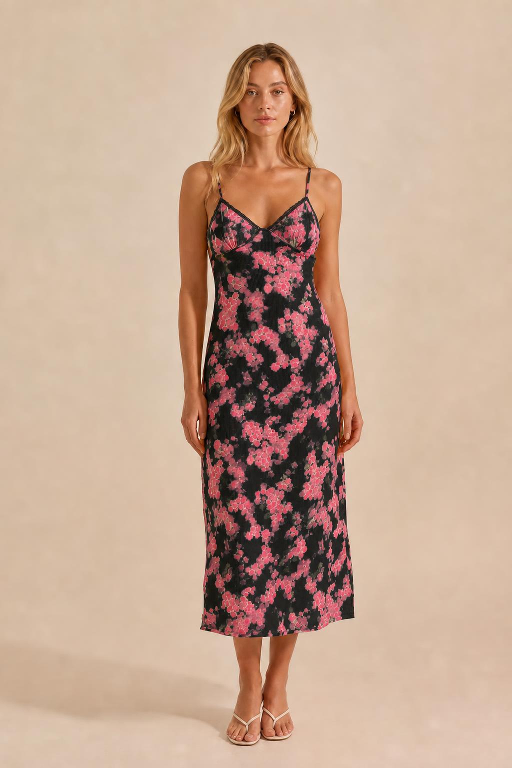 Front view of black floral midi slip dress