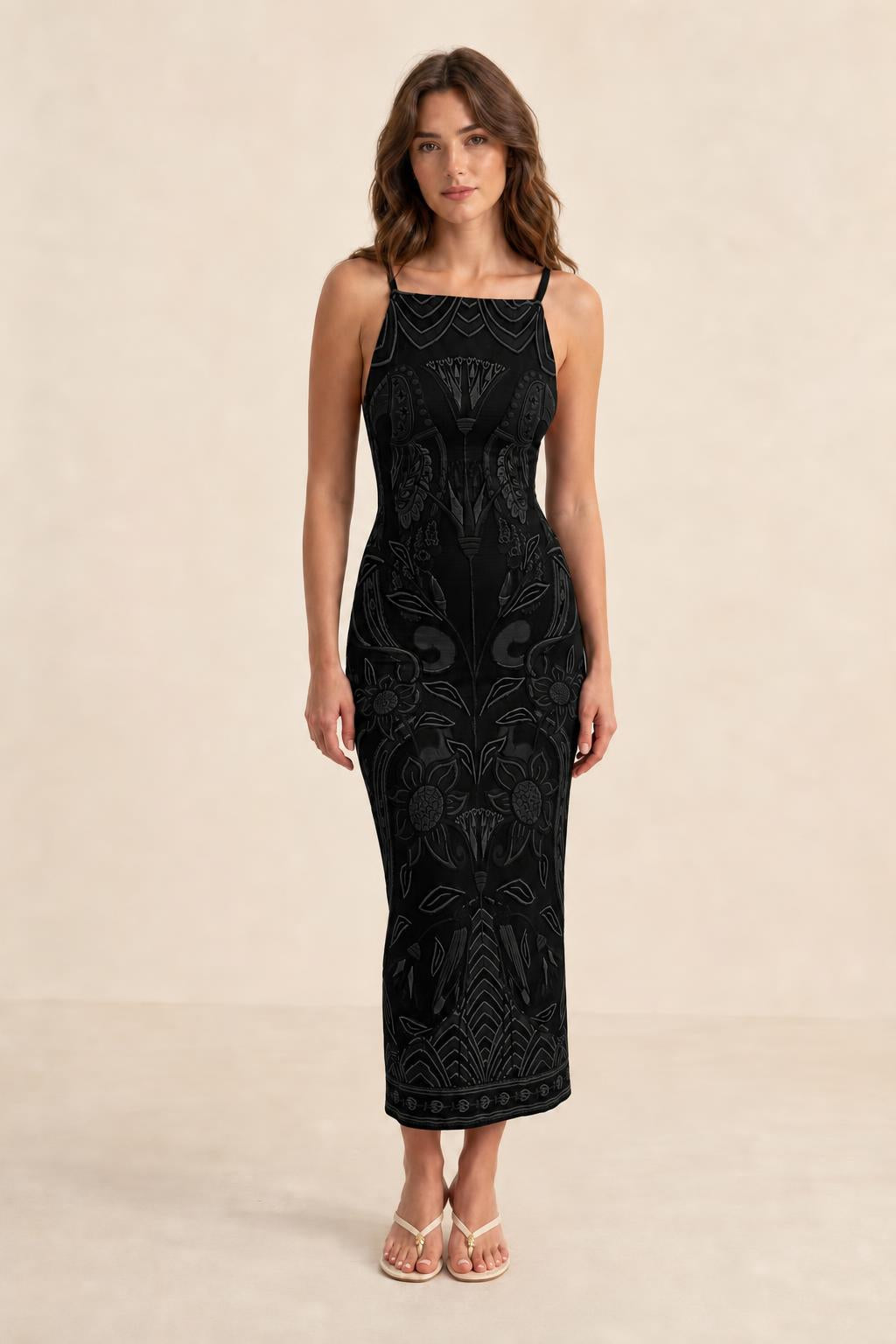 Full length front view of model wearing Black printed midi dress