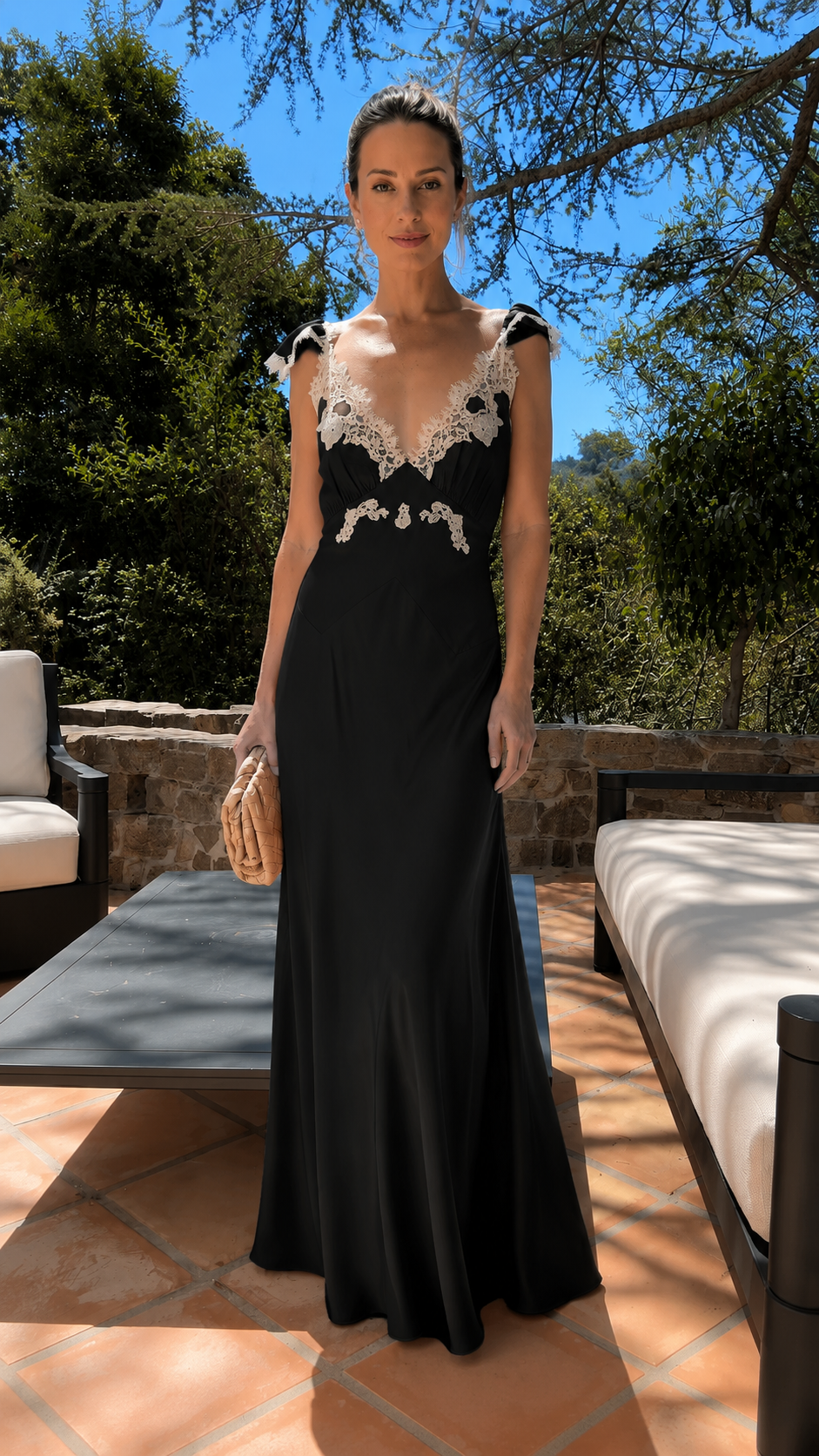Front view of black lace trim maxi dress with ruffle straps