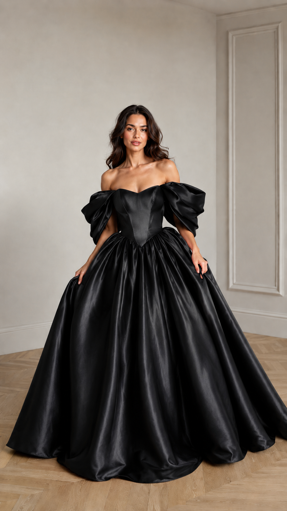 Front view of black off-shoulder puff sleeve ball gown with full satin-look skirt