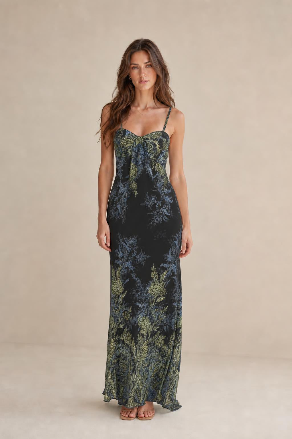 Model wearing black floral maxi dress