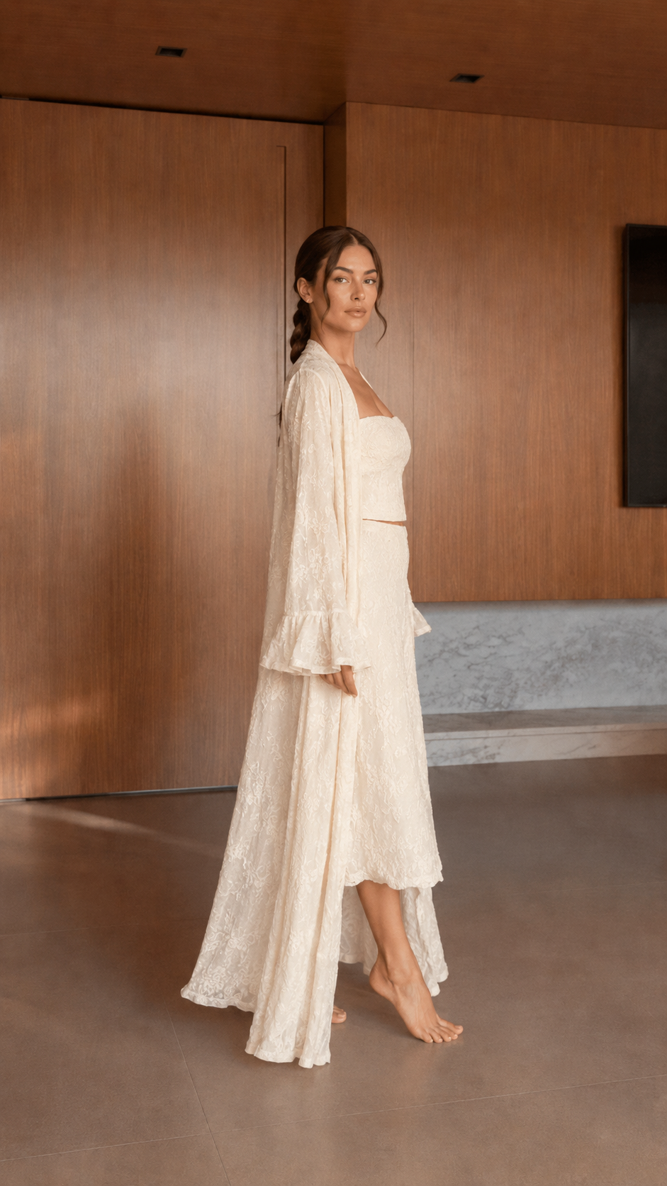 Side view of ivory textured matching set with flowing longline duster